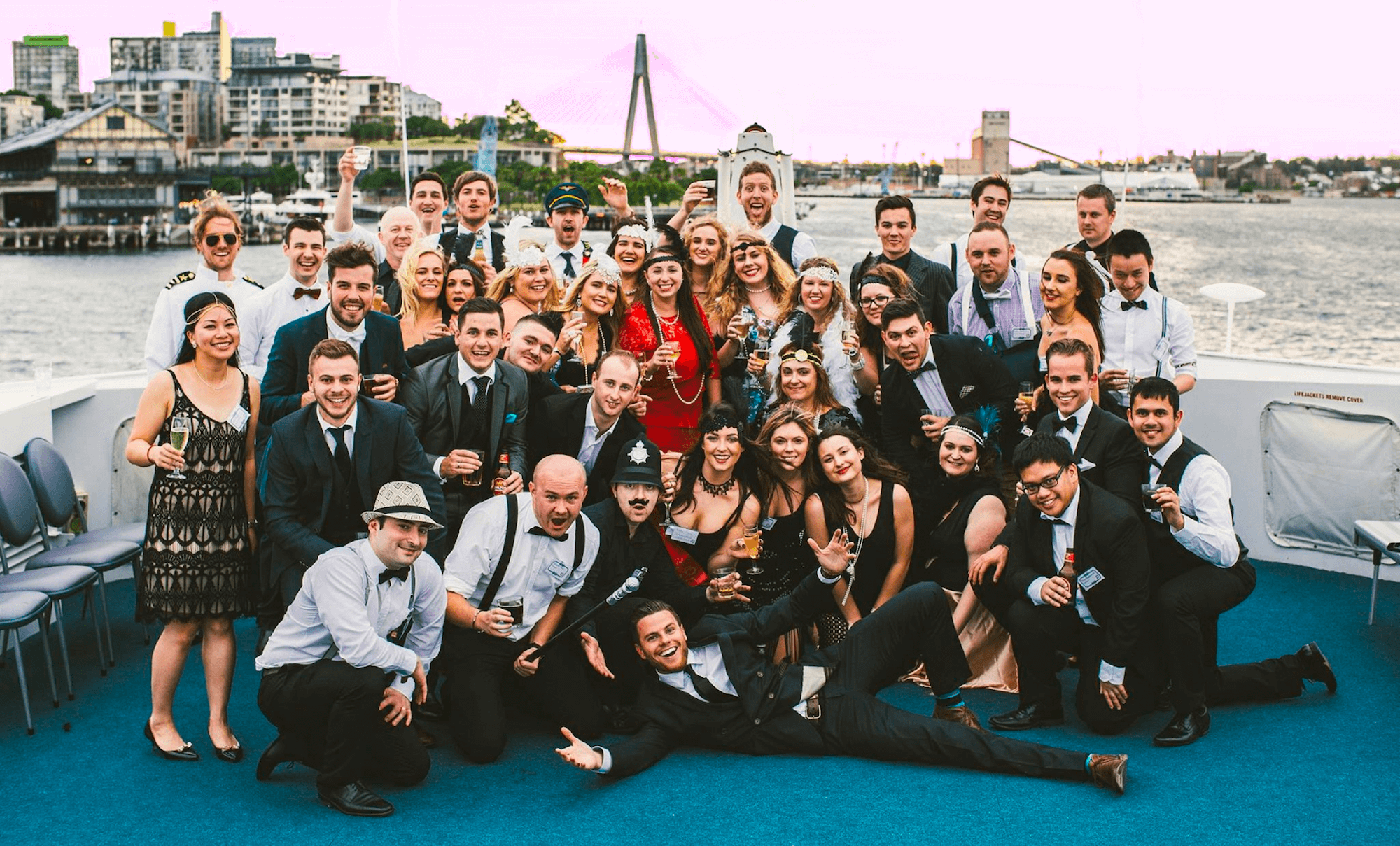 Group of people in dress up on a boat